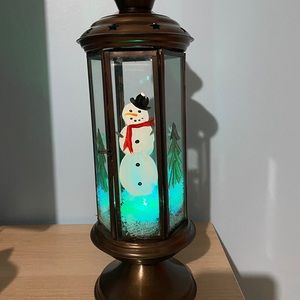 Metal and tempered glass lantern with snowman